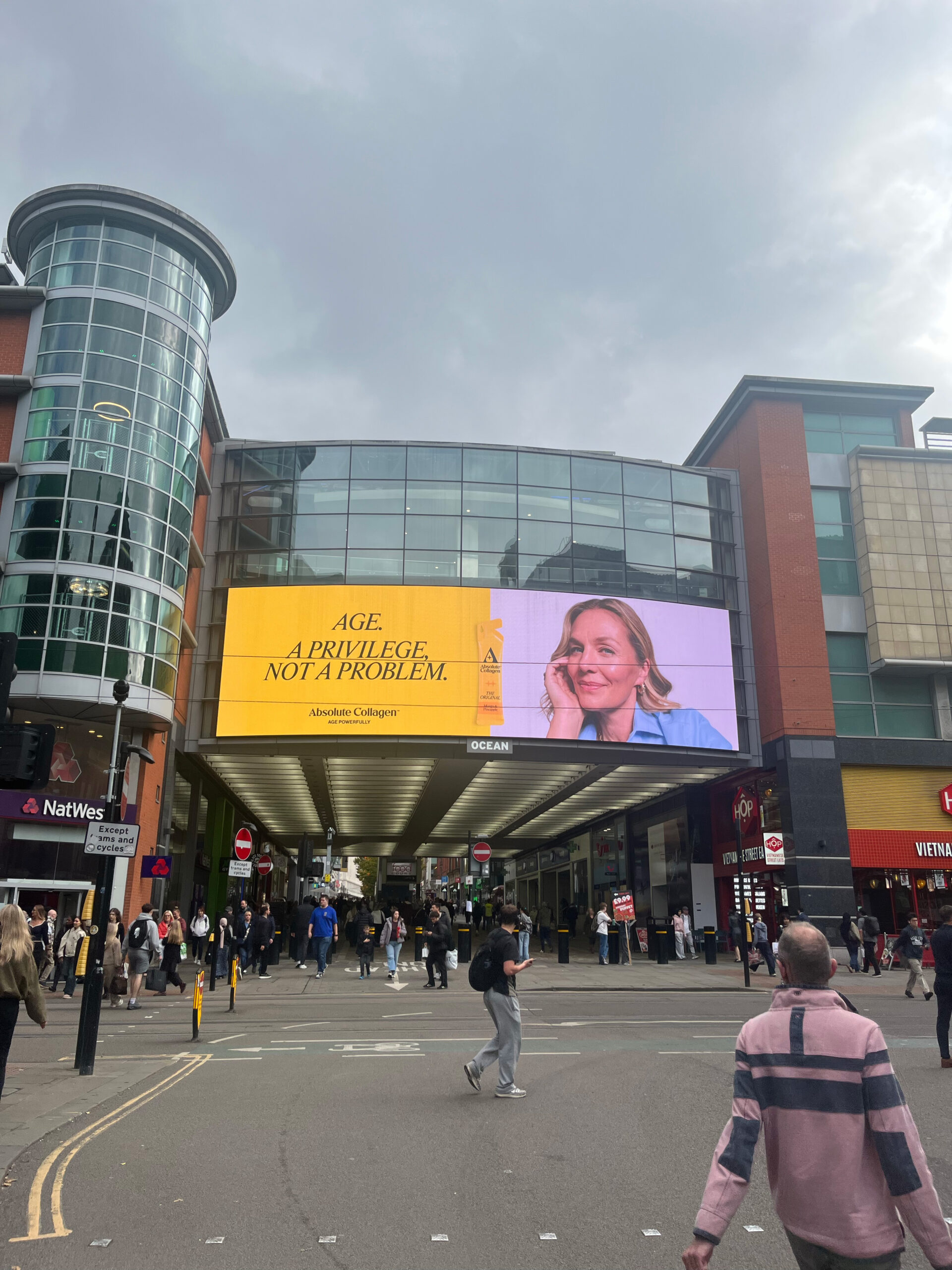 Absolute Collagen Age a privilege, not a problem campaign on a large shopping centre screen