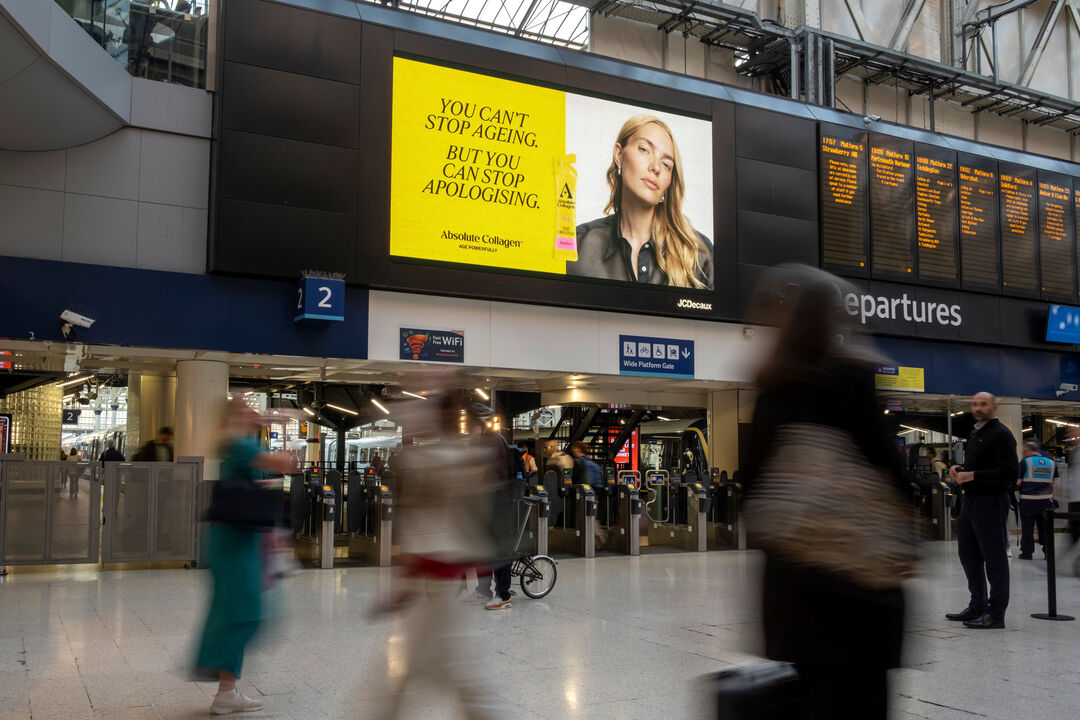 Absolute Collagen You can't stop ageing but you can stop apologising poster displayed at a railway station